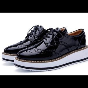 Platform wingtip Oxford shoes